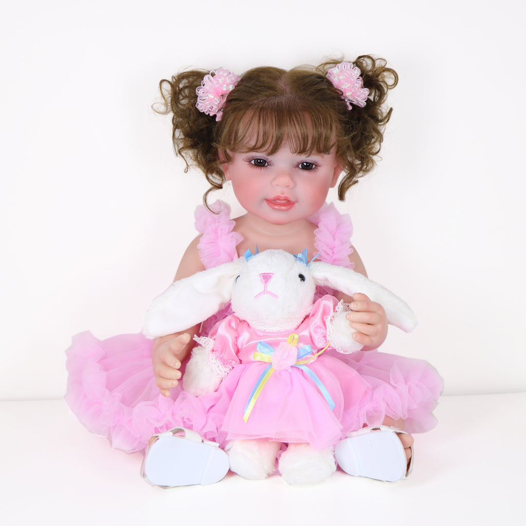 Poupée Reborn de 22 pouces - Mouvement joyeux avec un visage peint 3D, un corps en vinyle souple et des cheveux racinés, accompagné d'un petit lapin en peluche, parfait pour des cadeaux de Noël, d'Halloween ou de Thanksgiving.