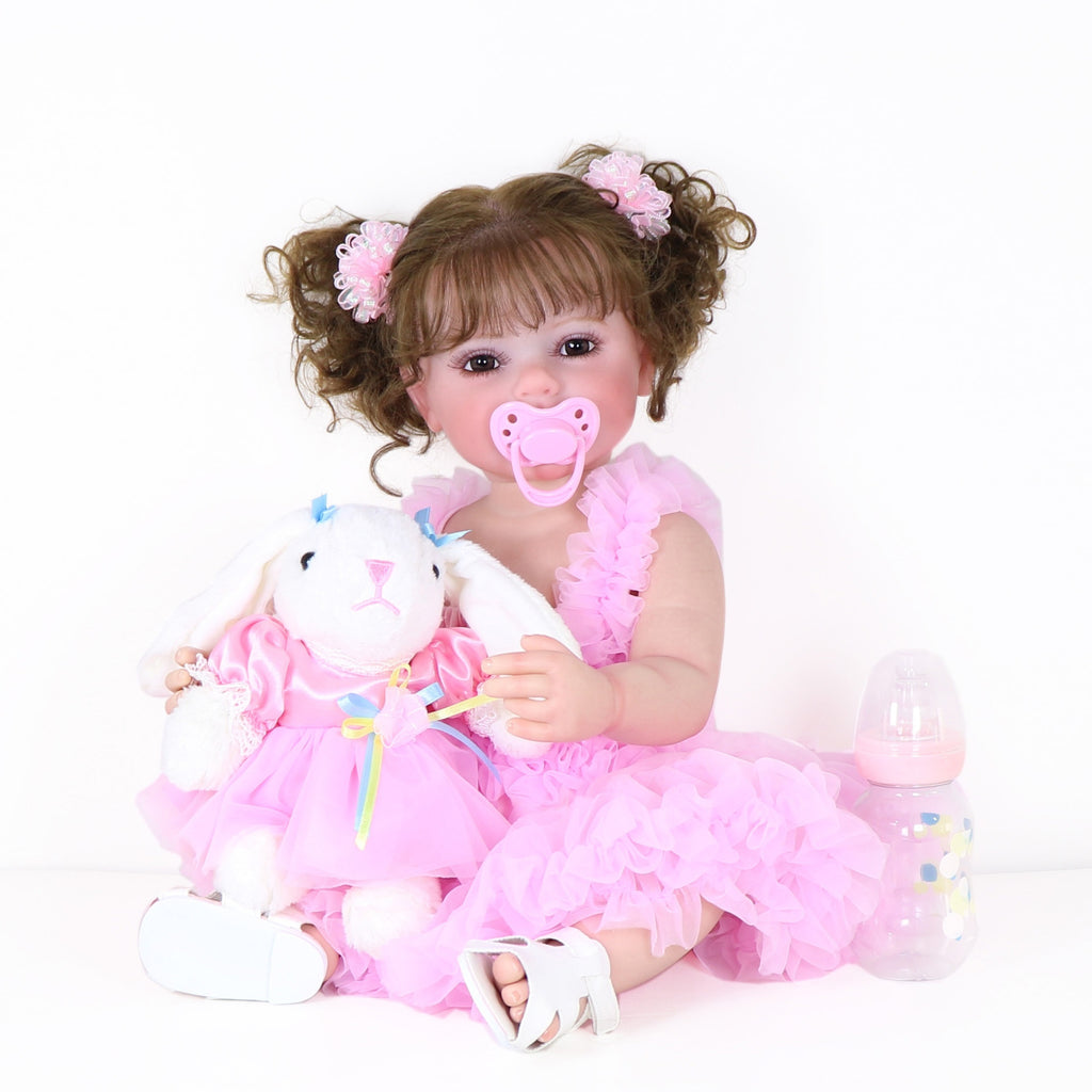 Poupée Reborn de 22 pouces - Mouvement joyeux avec un visage peint 3D, un corps en vinyle souple et des cheveux racinés, accompagné d'un petit lapin en peluche, parfait pour des cadeaux de Noël, d'Halloween ou de Thanksgiving.