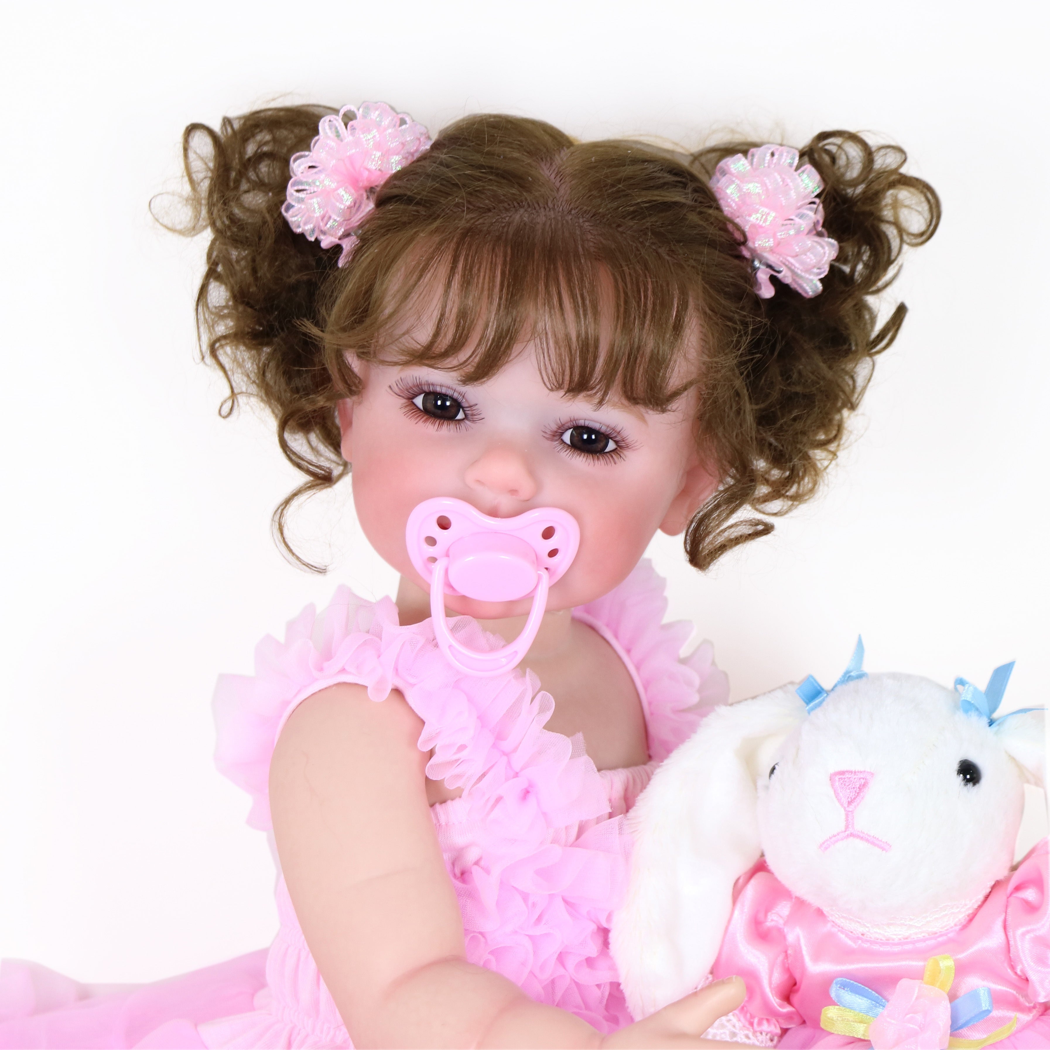 Poupée Reborn de 22 pouces - Mouvement joyeux avec un visage peint 3D, un corps en vinyle souple et des cheveux racinés, accompagné d'un petit lapin en peluche, parfait pour des cadeaux de Noël, d'Halloween ou de Thanksgiving.